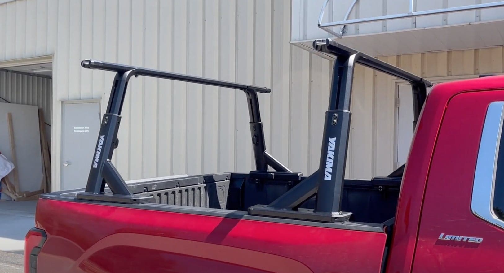 Overhaul truck ladder rack system installed on back of red '23 Toyota Tundra